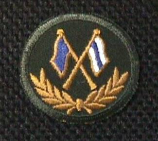 [Signal Corps badge]